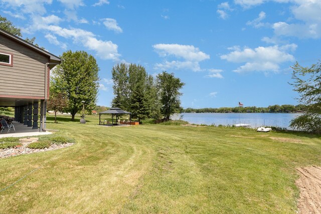 27667 Bay Shore Dr NW, Isanti, MN 55040 - view of grassy yard featuring a gazebo and a water view