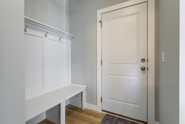 8683 Peony Ln N, Maple Grove, MN 55311 - mudroom featuring light wood-style floors and baseboards