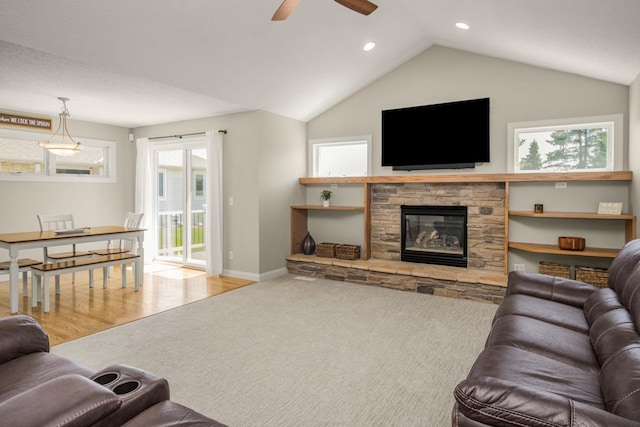 5057 Linden Trl N, Lake Elmo, MN 55042 - carpeted living room featuring vaulted ceiling, ceiling fan, baseboards, recessed lighting, and a fireplace