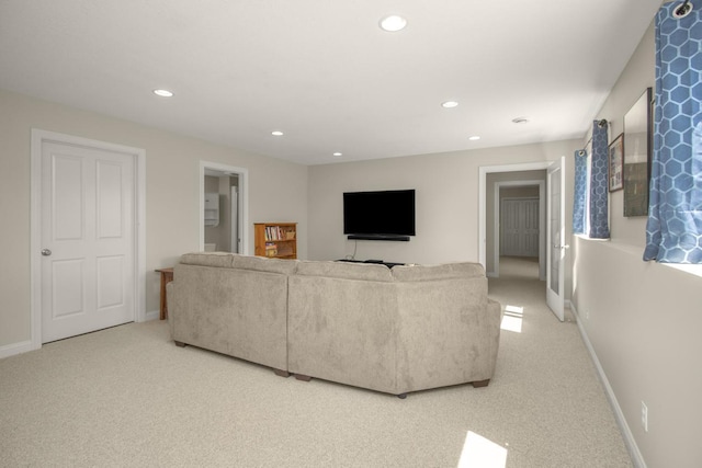 5057 Linden Trl N, Lake Elmo, MN 55042 - living area featuring light carpet, recessed lighting, and baseboards