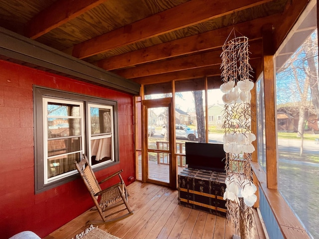 506 2nd St S, Tower, MN 55790 - sunroom with wood-type flooring and beam ceiling