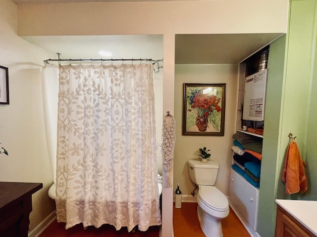 506 2nd St S, Tower, MN 55790 - full bathroom with toilet, a shower with shower curtain, vanity, and baseboards