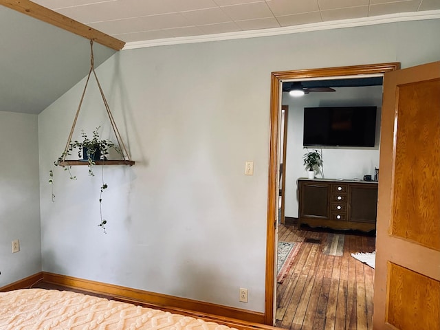 506 2nd St S, Tower, MN 55790 - corridor featuring wood-type flooring, baseboards, and crown molding