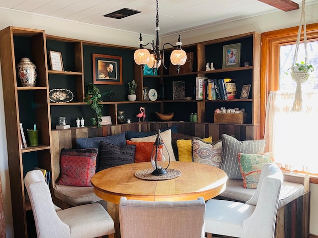 506 2nd St S, Tower, MN 55790 - dining room with a chandelier and built in features