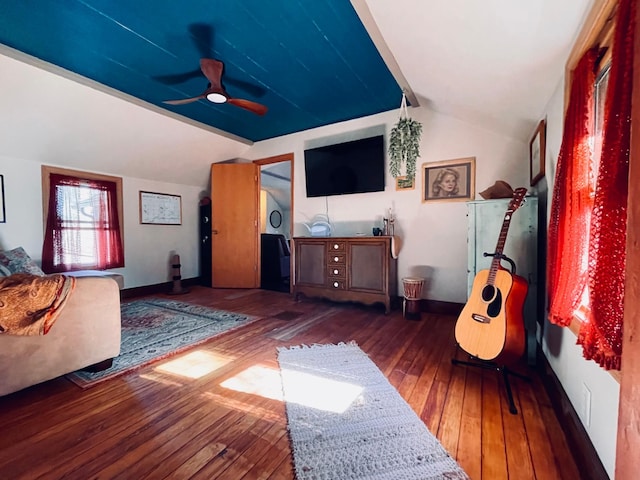 506 2nd St S, Tower, MN 55790 - living area with vaulted ceiling, hardwood / wood-style floors, a ceiling fan, and baseboards