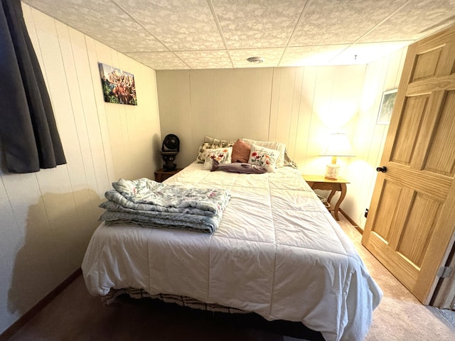 23479 State 200, Itasca Twp, MN 56676 - bedroom with carpet flooring and wood walls