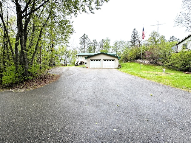 23479 State 200, Itasca Twp, MN 56676 - view of front of property with a front yard and driveway