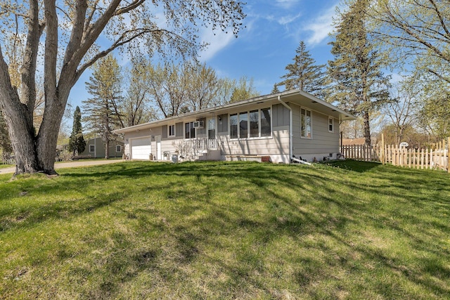 ranch-style house featuring an attached garage