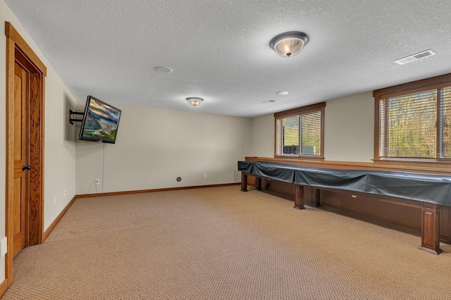 1901 11th St N, Sartell, MN 56377 - game room featuring carpet, a textured ceiling, and baseboards