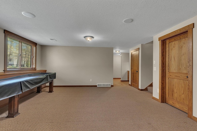 1901 11th St N, Sartell, MN 56377 - playroom with baseboards, light carpet, and a textured ceiling