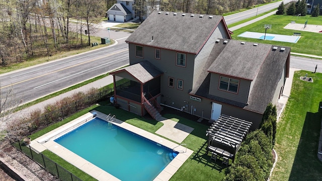 1901 11th St N, Sartell, MN 56377 - view of swimming pool with a sunroom