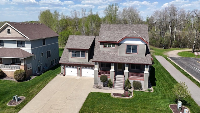 1901 11th St N, Sartell, MN 56377 - craftsman-style home featuring driveway, a porch, a garage, a shingled roof, and stairway
