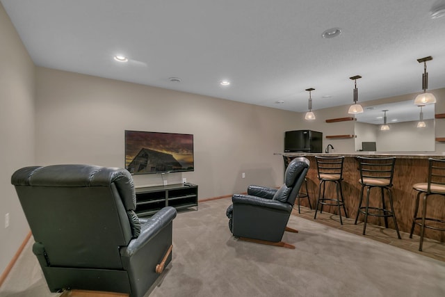 1908 5th St N, Sartell, MN 56377 - living area featuring wet bar, baseboards, light carpet, and recessed lighting