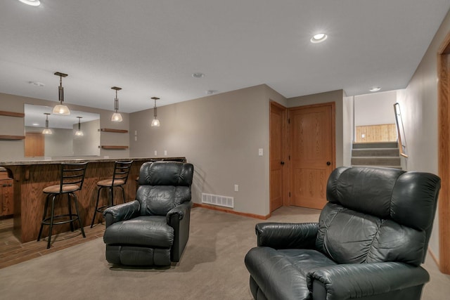 1908 5th St N, Sartell, MN 56377 - sitting room featuring wet bar, baseboards, stairway, and recessed lighting