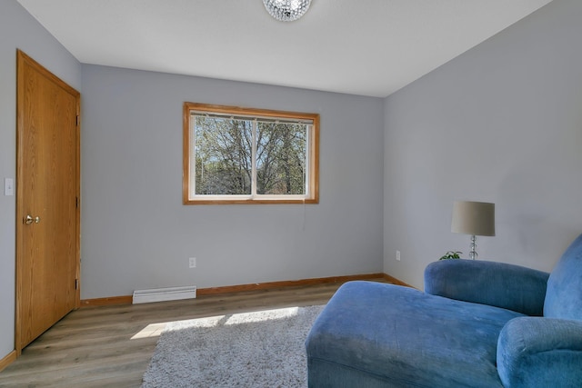 1908 5th St N, Sartell, MN 56377 - sitting room with baseboards and light wood-type flooring