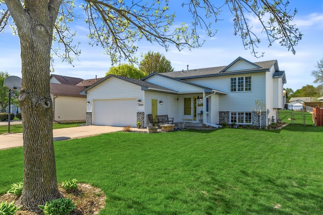 7884 77th St S, Cottage Grove, MN 55016 - tri-level home featuring concrete driveway, a garage, and a shingled roof