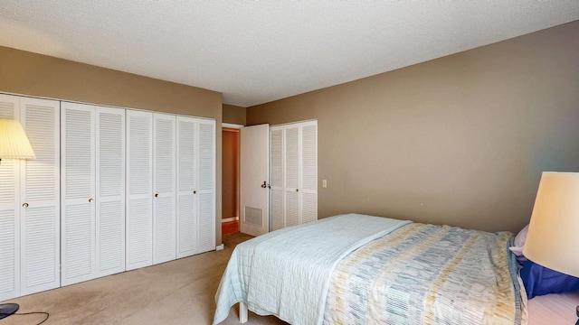 bedroom featuring carpet