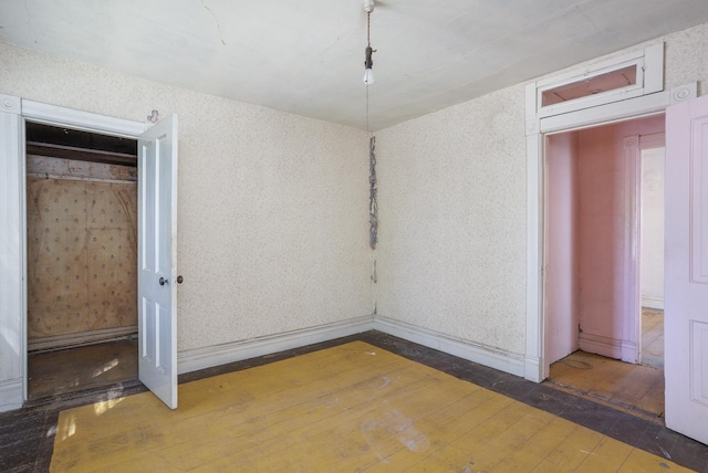 414 4th St, Winthrop, MN 55396 - unfurnished room with hardwood / wood-style flooring and baseboards