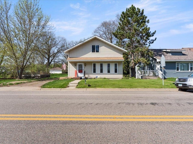 611 3rd St SW, Crosby, MN 56441 - bungalow-style house with a front lawn