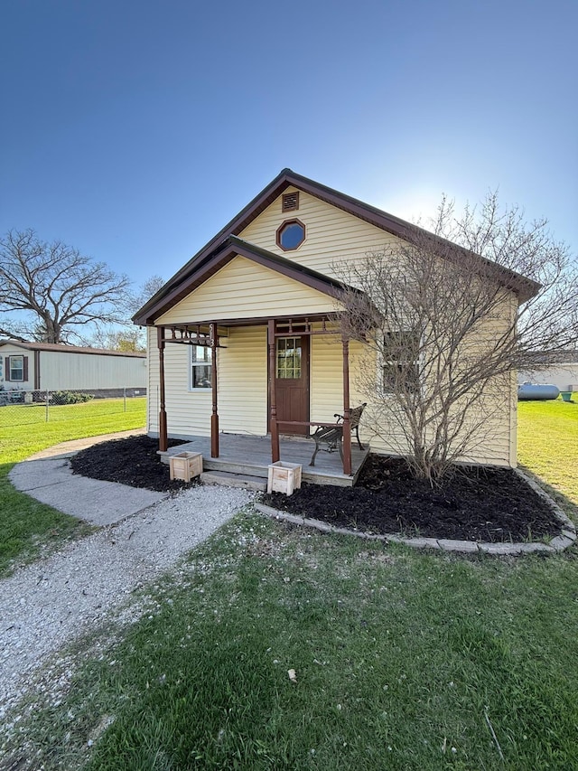 513 Water Ave N, Saint Hilaire, MN 56754 - view of front of property with a front lawn and covered porch