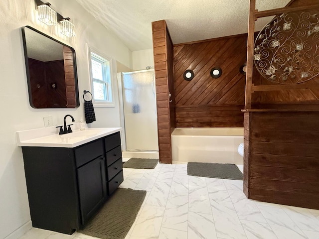513 Water Ave N, Saint Hilaire, MN 56754 - bathroom with marble finish flooring, a stall shower, vanity, a garden tub, and a textured ceiling