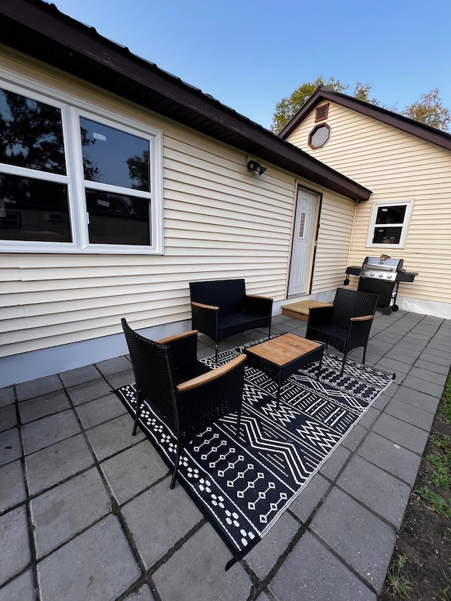 513 Water Ave N, Saint Hilaire, MN 56754 - view of patio with an outdoor living space and a grill