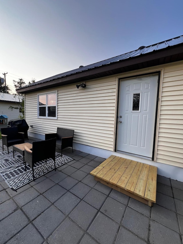 513 Water Ave N, Saint Hilaire, MN 56754 - rear view of property with a patio and an outdoor living space