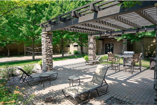 view of patio with a pergola and outdoor dining space