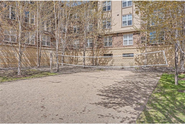 view of property's community with volleyball court