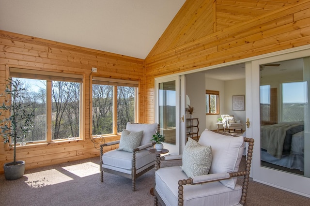532 150th St, Alden Twp, WI 54001 - sunroom / solarium with carpet floors, lofted ceiling, and wood walls