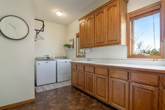 532 150th St, Alden Twp, WI 54001 - laundry area featuring cabinet space, independent washer and dryer, and baseboards