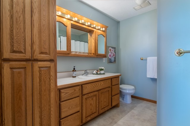 532 150th St, Alden Twp, WI 54001 - full bath featuring toilet, vanity, tile patterned floors, and baseboards
