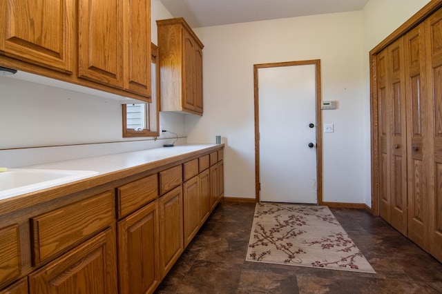 532 150th St, Alden Twp, WI 54001 - laundry area with baseboards and a sink