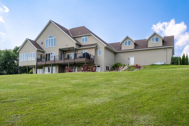 532 150th St, Alden Twp, WI 54001 - rear view of property with a yard, a deck, and a shingled roof