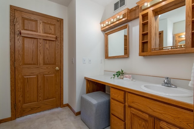 532 150th St, Alden Twp, WI 54001 - bathroom with baseboards and vanity