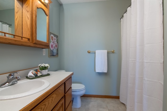 532 150th St, Alden Twp, WI 54001 - bathroom featuring toilet, vanity, curtained shower, and baseboards