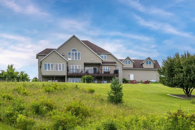 532 150th St, Alden Twp, WI 54001 - back of property with a wooden deck, a yard, and a shingled roof