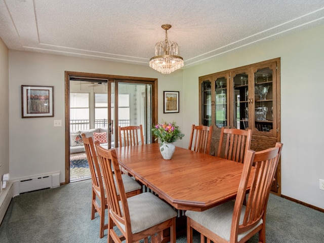 3509 Coolidge St NE, Saint Anthony, MN 55418 - carpeted dining room with baseboard heating, a chandelier, and a textured ceiling