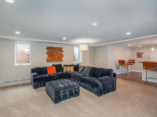 3509 Coolidge St NE, Saint Anthony, MN 55418 - carpeted living room with baseboard heating, a textured ceiling, and recessed lighting