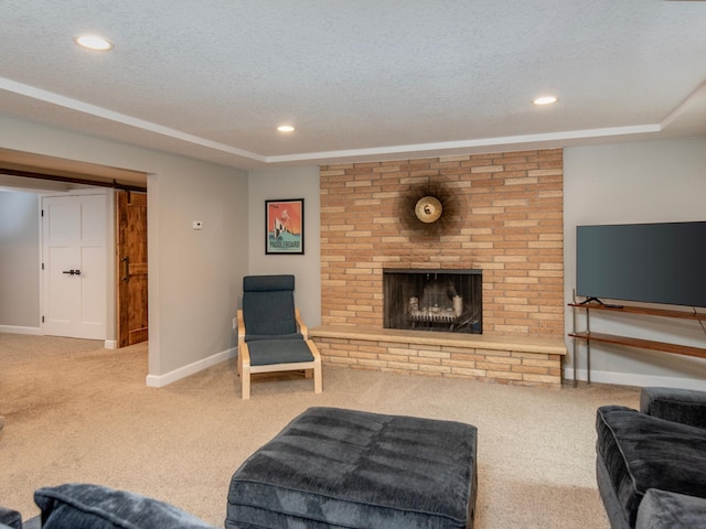 3509 Coolidge St NE, Saint Anthony, MN 55418 - carpeted living room with a textured ceiling, a fireplace, and recessed lighting
