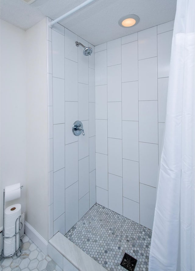 3509 Coolidge St NE, Saint Anthony, MN 55418 - full bath featuring a tile shower and tile patterned flooring