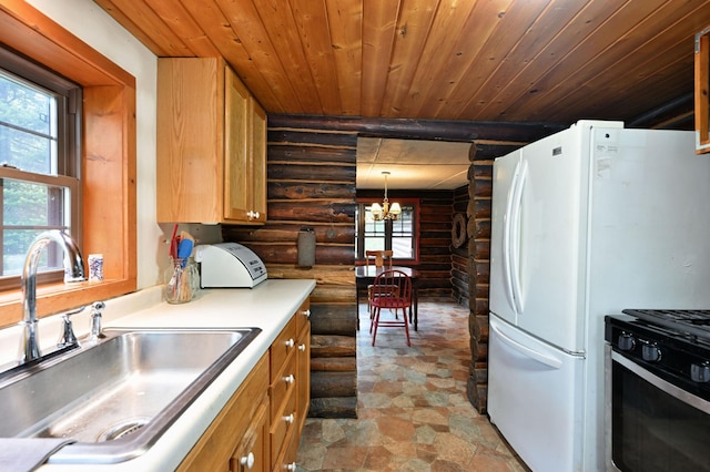 9262 Park Ave, Solon Springs, WI 54873 - kitchen with log walls, a sink, wood ceiling, stone finish floors, and stainless steel range with gas stovetop