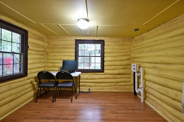 9262 Park Ave, Solon Springs, WI 54873 - home office with plenty of natural light, log walls, and wood finished floors