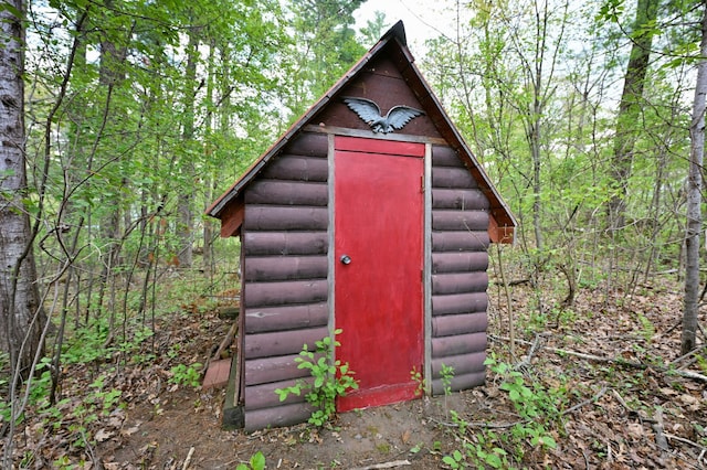 9262 Park Ave, Solon Springs, WI 54873 - view of shed featuring a forest view