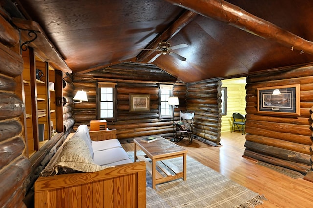9262 Park Ave, Solon Springs, WI 54873 - living area featuring ceiling fan, wood finished floors, and log walls