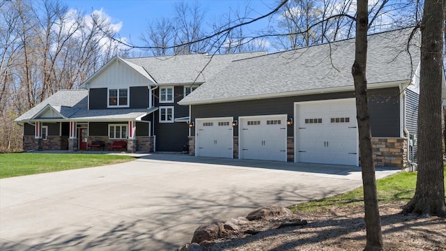 701 Chalupsky Ave SE, New Prague, MN 56071 - view of front of property featuring stone siding, driveway, a porch, and an attached garage