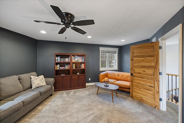 701 Chalupsky Ave SE, New Prague, MN 56071 - carpeted living area featuring recessed lighting, a ceiling fan, and baseboards