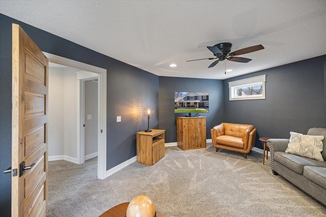 701 Chalupsky Ave SE, New Prague, MN 56071 - living area featuring carpet flooring, ceiling fan, baseboards, and recessed lighting
