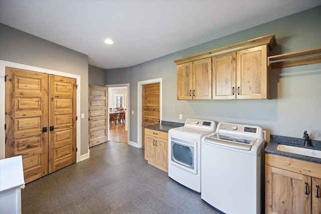 701 Chalupsky Ave SE, New Prague, MN 56071 - laundry area with cabinet space, washer and clothes dryer, recessed lighting, baseboards, and dark floors
