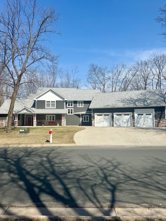 701 Chalupsky Ave SE, New Prague, MN 56071 - view of front facade with concrete driveway and an attached garage